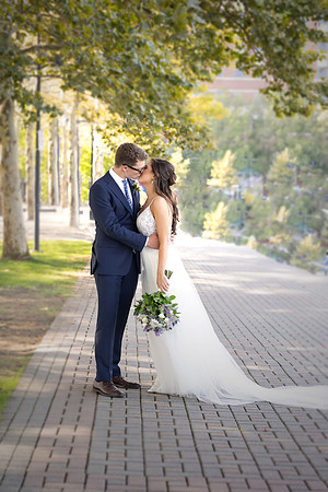 Bride and Groom Kissing under the Trees in Hoboken