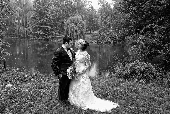 Bride and Groom in Central Park under the rain Black and white Photo