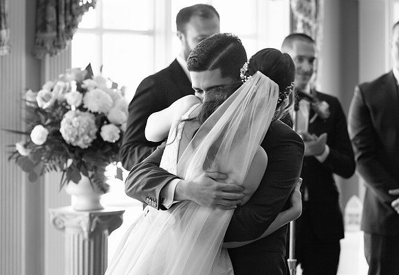 Bride and groom emotional moment at the ceremony  Black and White Photo