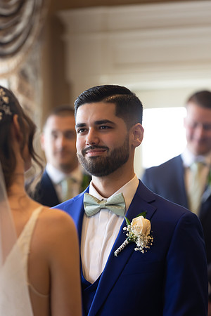 Groom looking at Bride at Falkirk Estate Wedding Ceremony