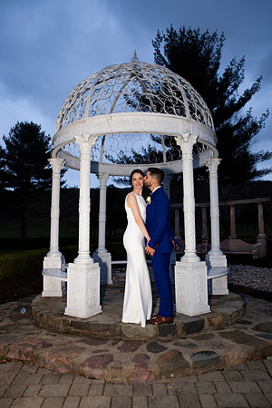 Groom Kissing Bride at Dusk in Falkirk Estate